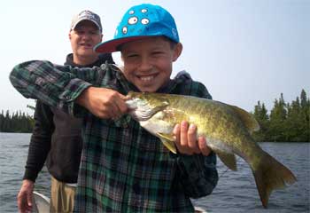 First Trophy Smallmouth Bass at 11-years old Fishing at Fireside Lodge